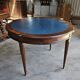 Elegant game table or circular extending side table in Louis XVI style.