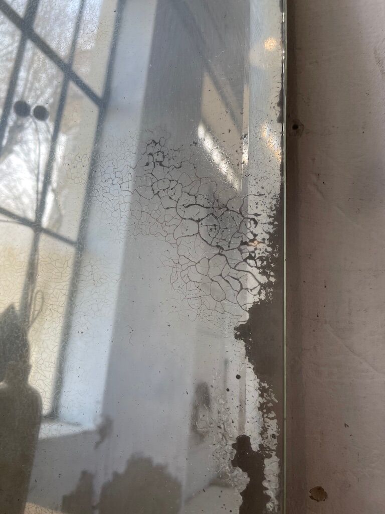 Very stung old bevelled mirror 39x60cm