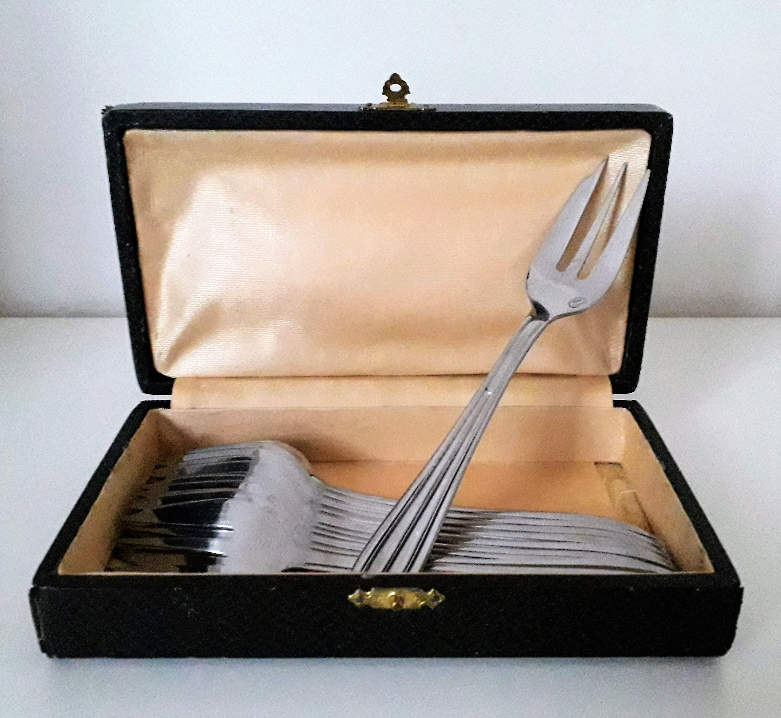 Antique oyster fork set.