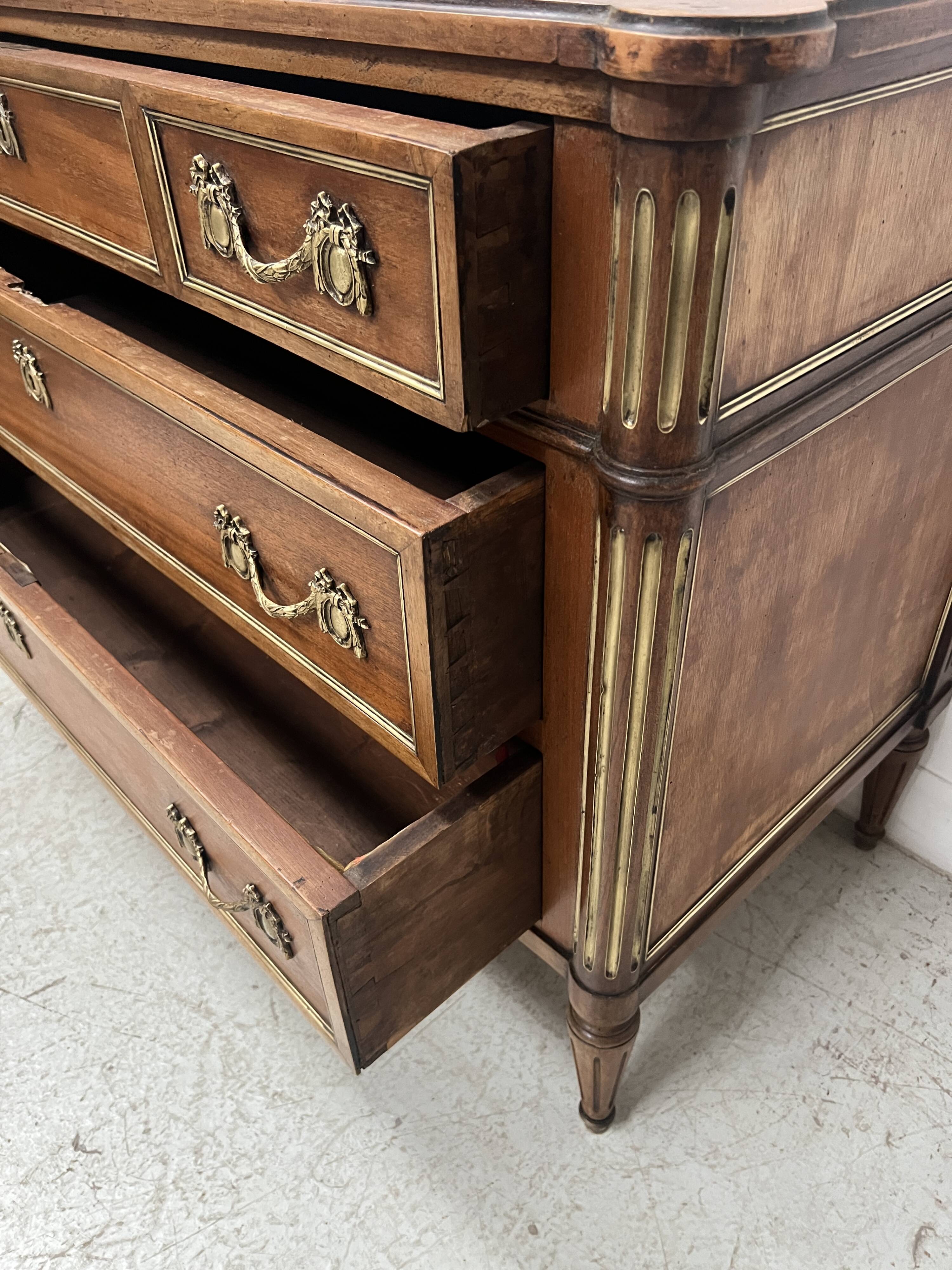 Louis XVI style mahogany commode with a grey veined marble top, 19th century