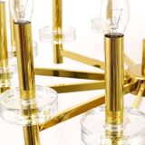 Brass and glass disc pendant light in the style of Gaetano Sciolari, mid-century, Italy, 1970s.