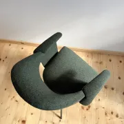 Curved vintage wool armchair from the 1960s