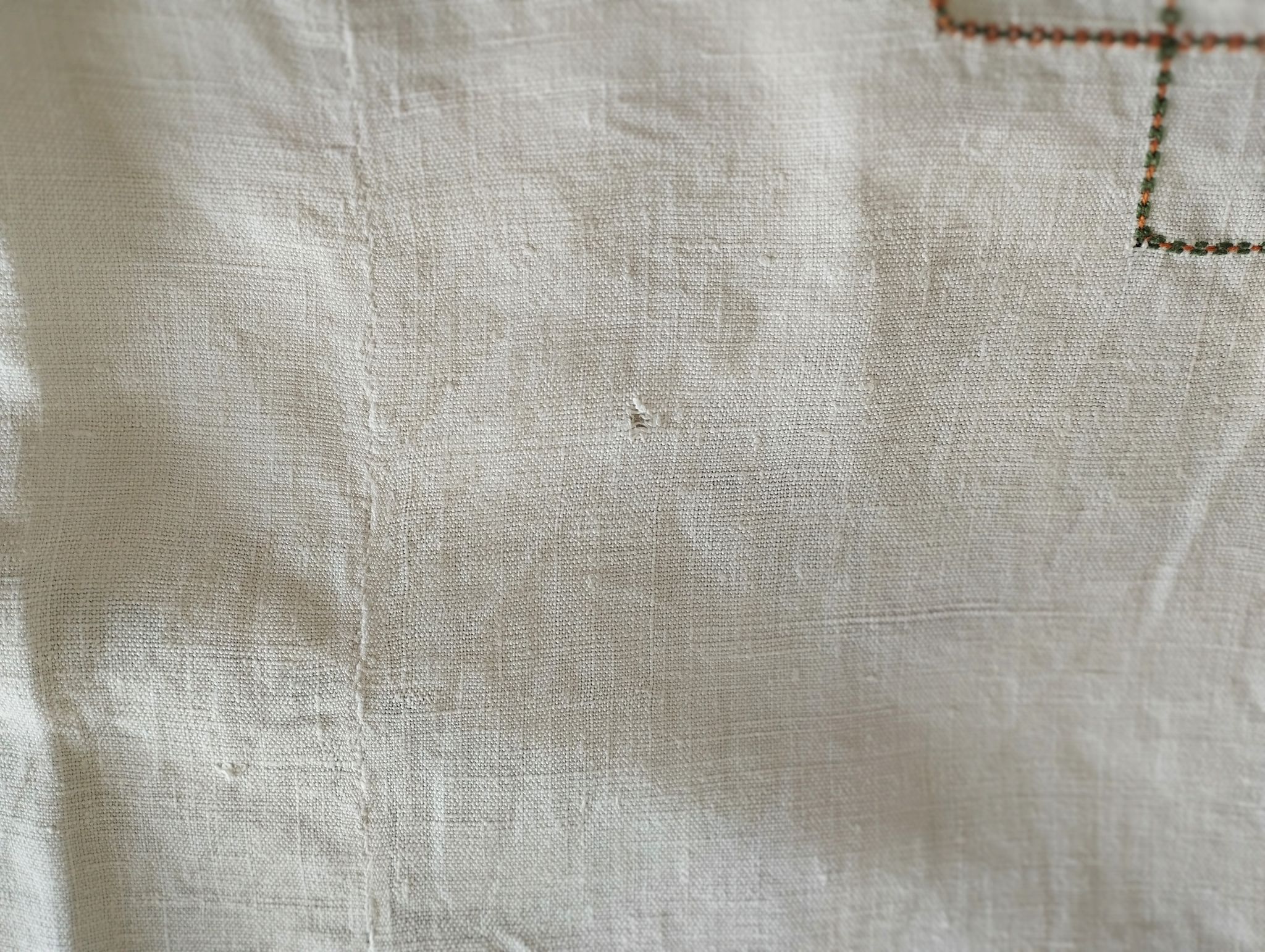 Antique linen tablecloth embroidered with flowers