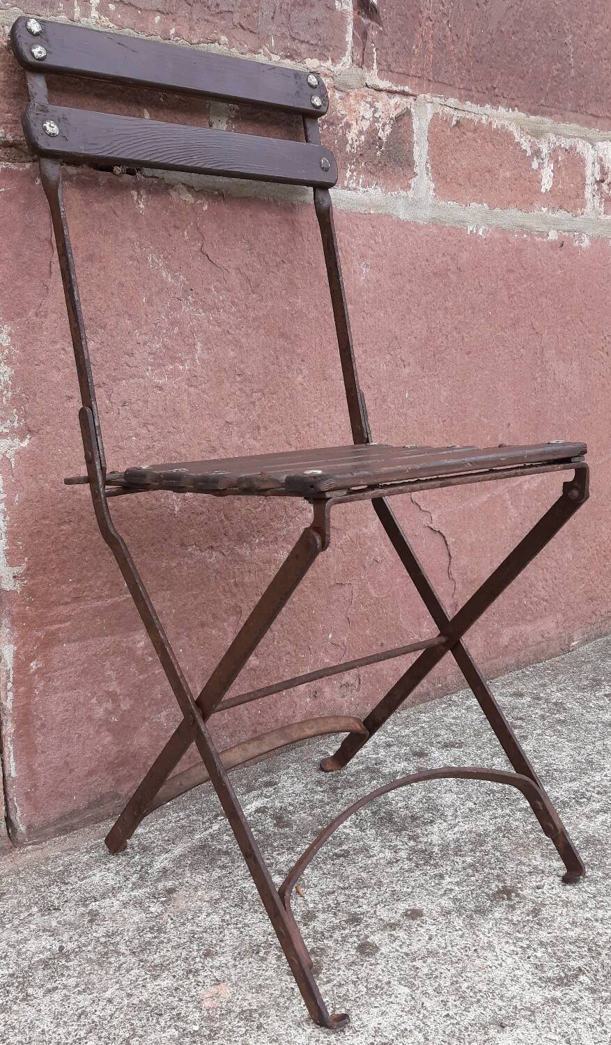 Foldable wrought iron chair
