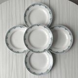 Set of 5 Saint Amand iron earth plates.