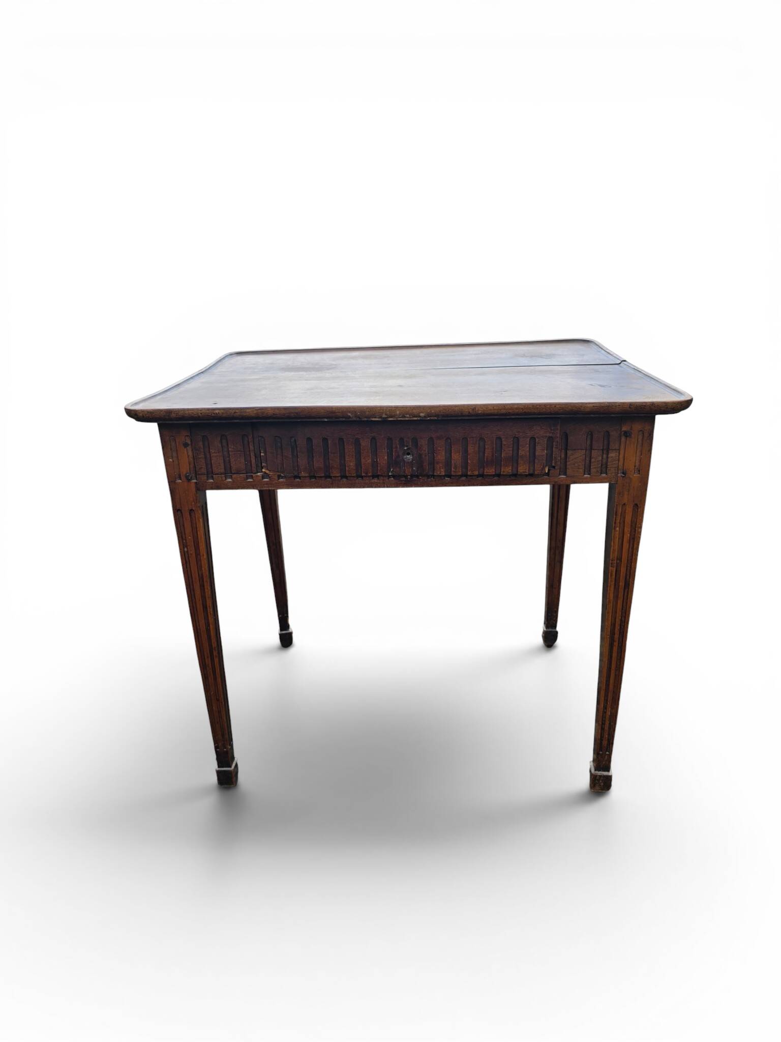 Antique game table in patinated wood in the Louis XVI style.