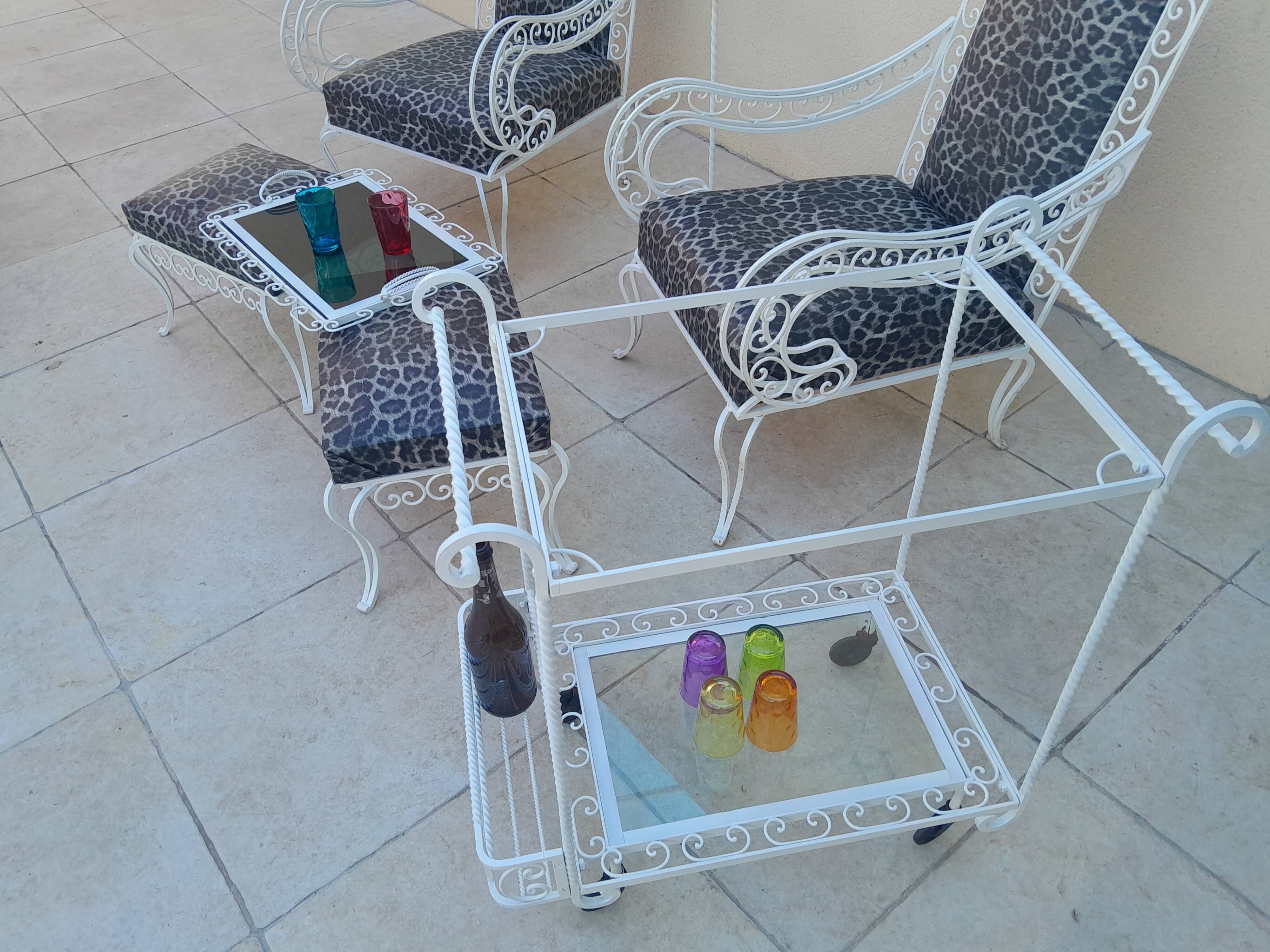 Pair of ottoman armchairs with wrought iron serving trolley, vintage garden, old design