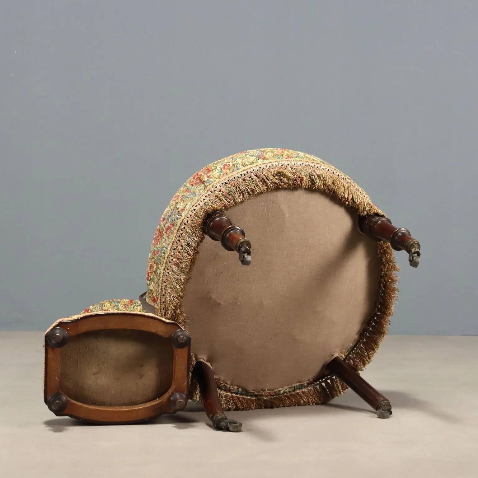 Victorian armchair with fabric pouf, England, 19th century.