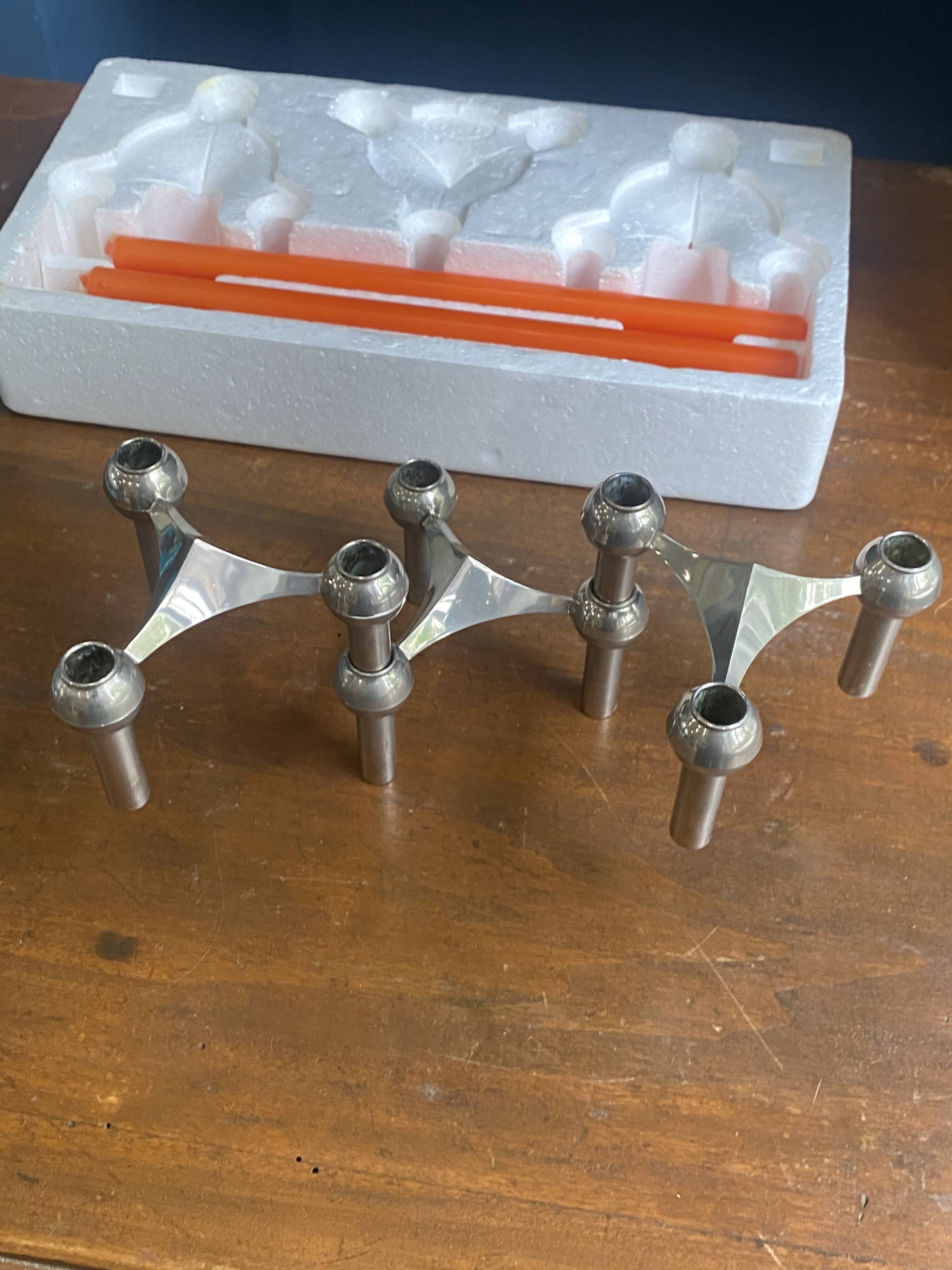 Set of 3 S22 candle holders and 9 vintage 1970 NAGEL modular candles in box.