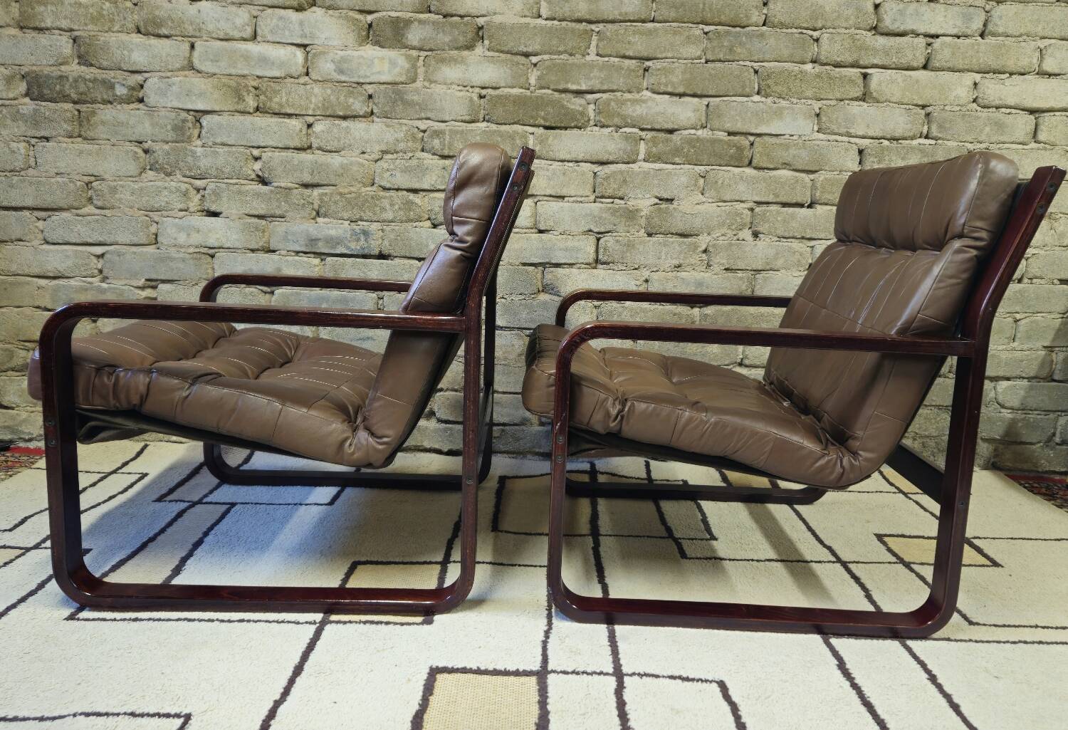 Pair of vintage 1970s faux leather armchairs