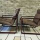 Pair of vintage 1970s faux leather armchairs