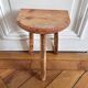 Tripod stool in raw wood