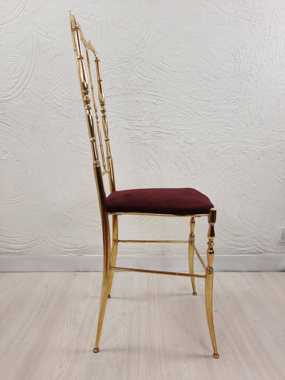 Pair of chiavarine chairs, brass