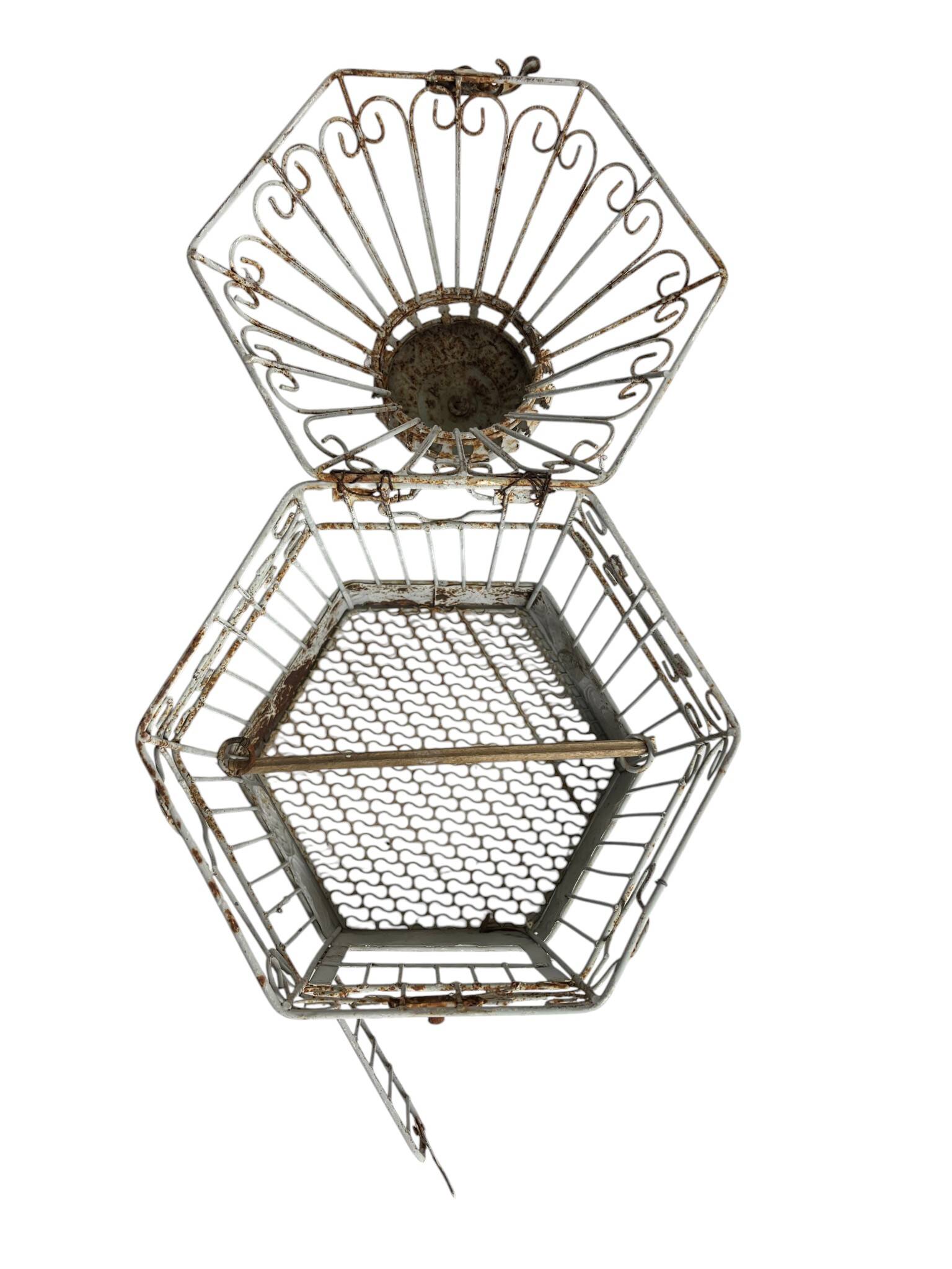 Vintage hexagonal metal birdcage from around 1940.