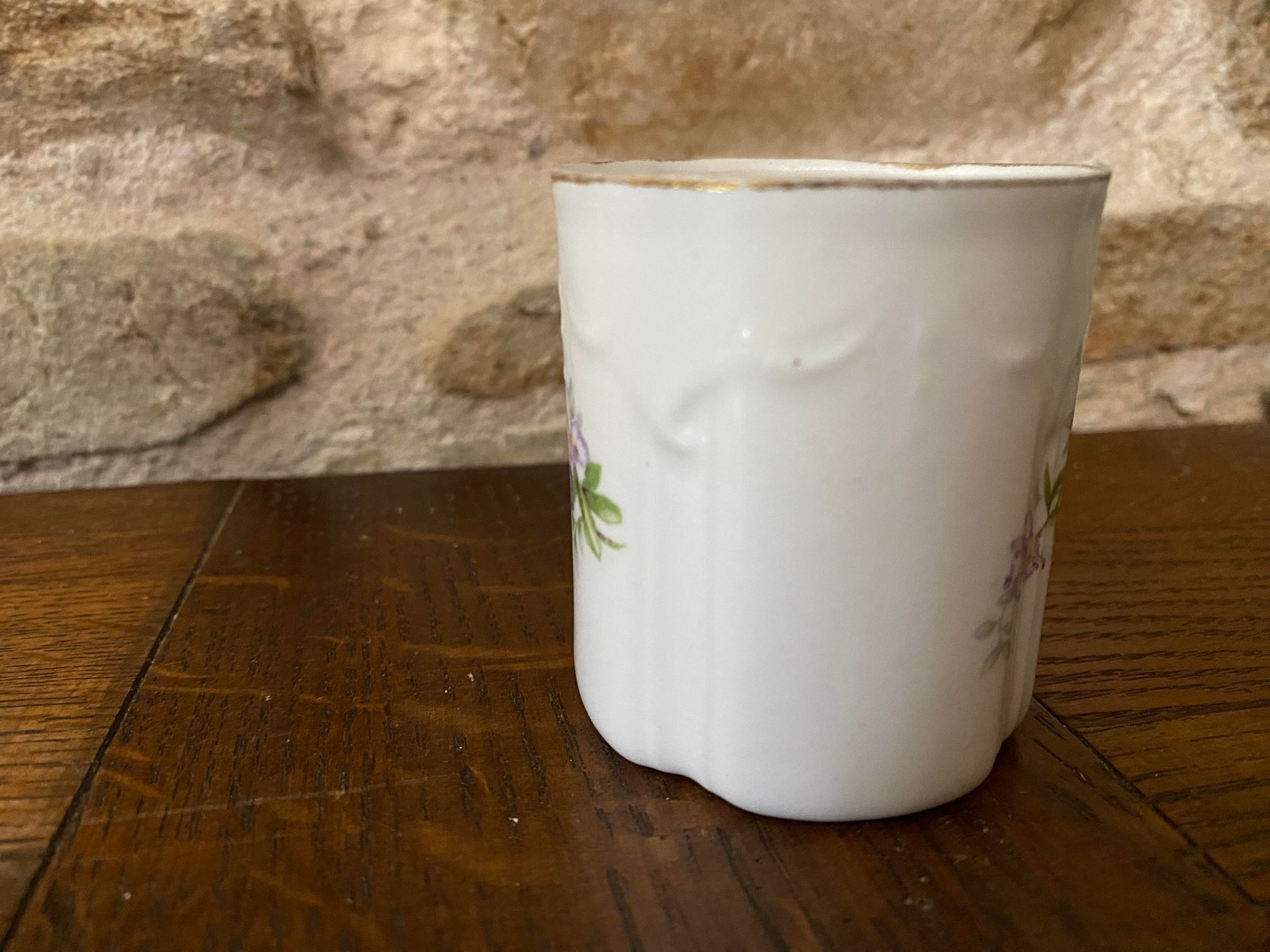 Porcelain cup fine decoration flowers and golden edge