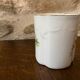Porcelain cup fine decoration flowers and golden edge