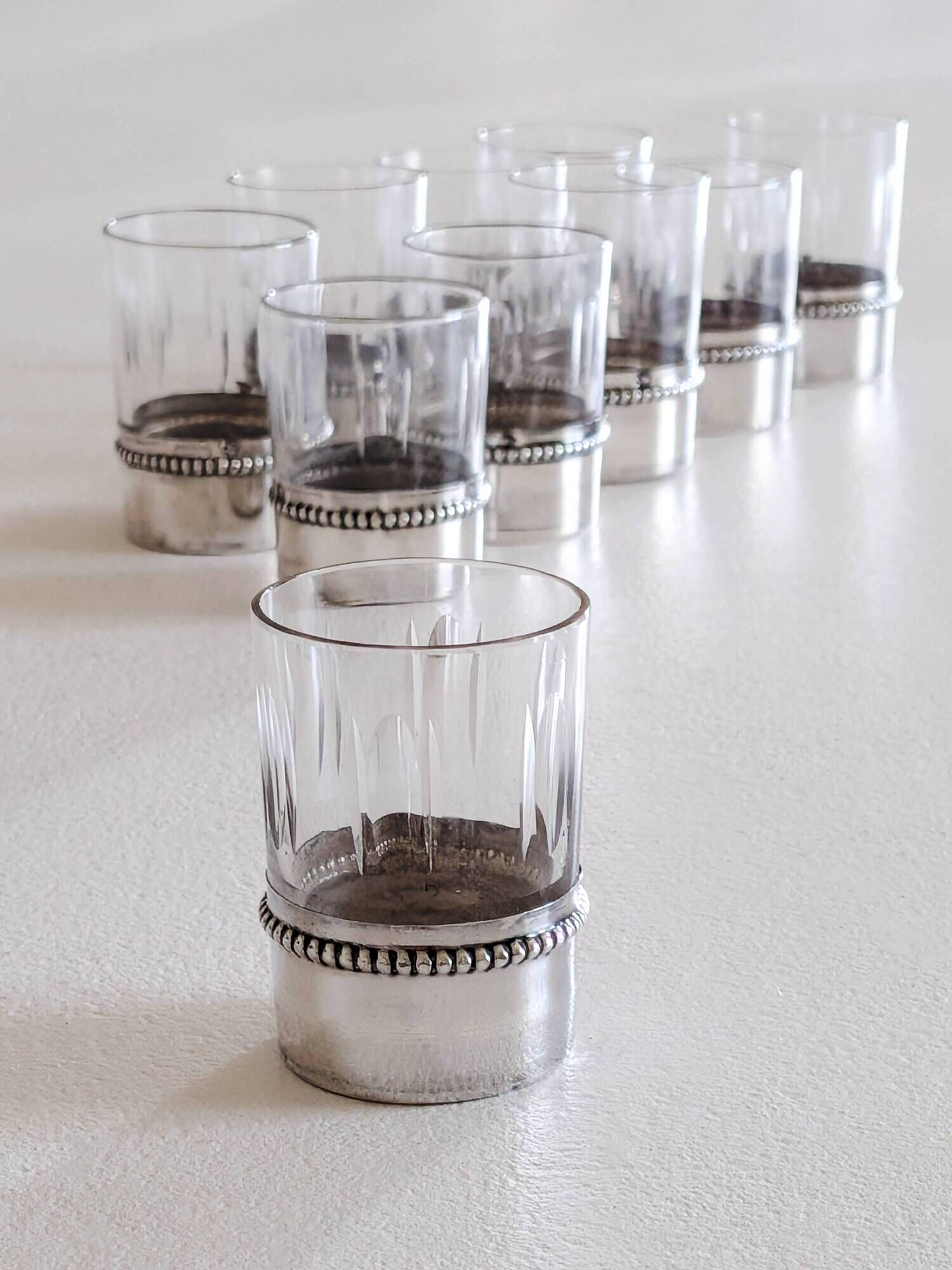 Liqueur service with 10 crystal glasses, solid silver and tray.