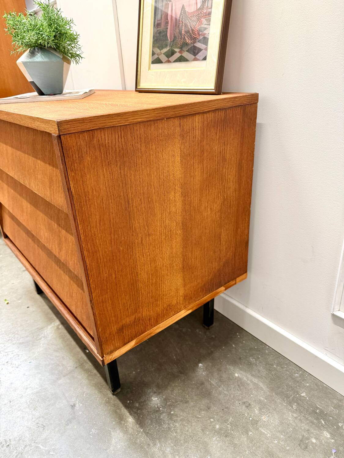 Modernist chest of drawers with slanted drawers