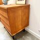 Modernist chest of drawers with slanted drawers