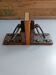 Medieval-style bookends, antique door handle.