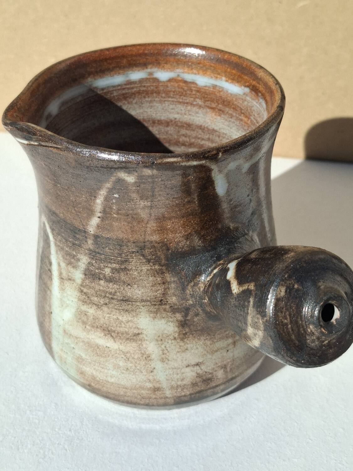 Stoneware pitcher signed by Jacques Pouchain.