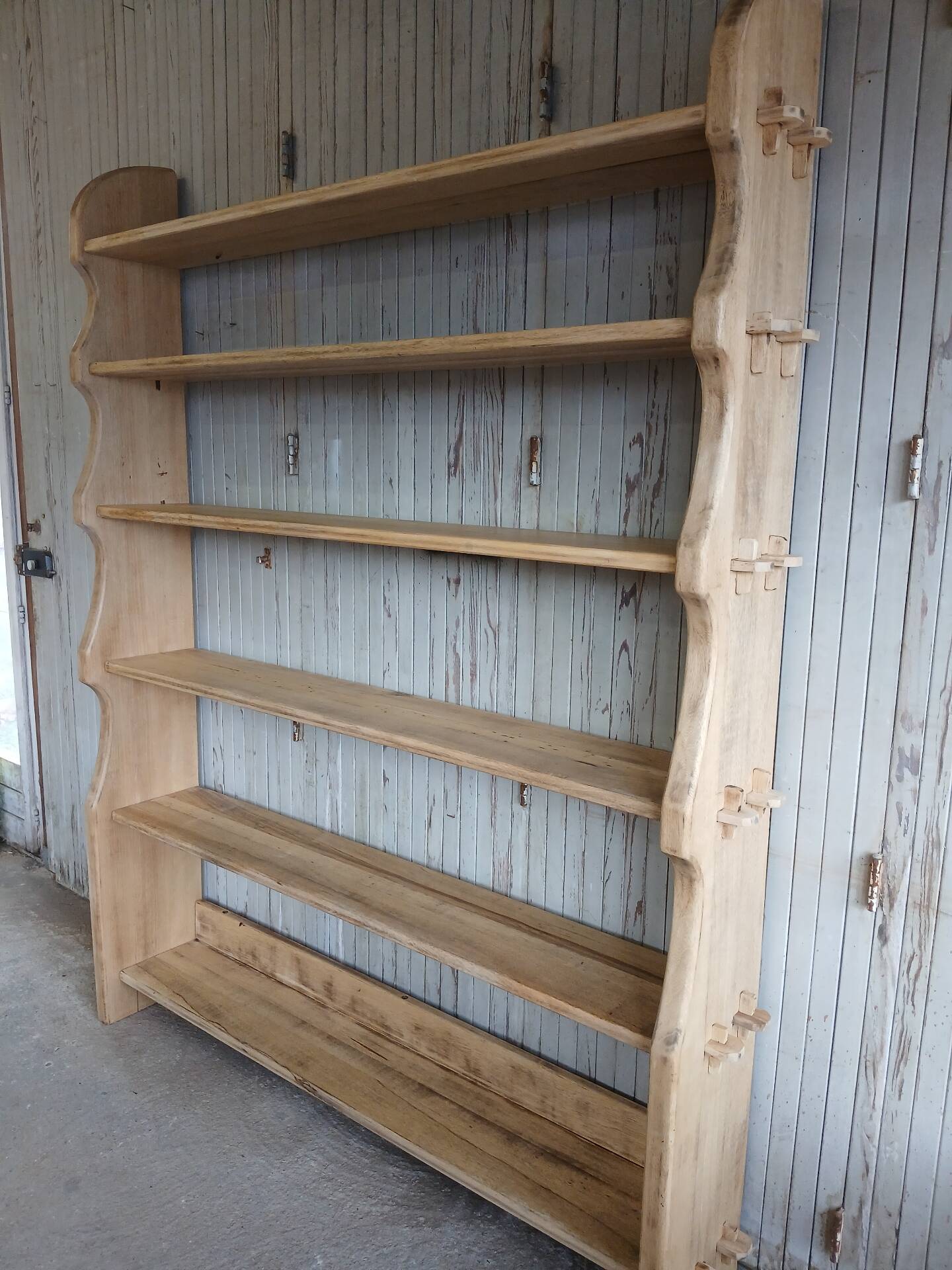 Solid wood shelf in brutalist style