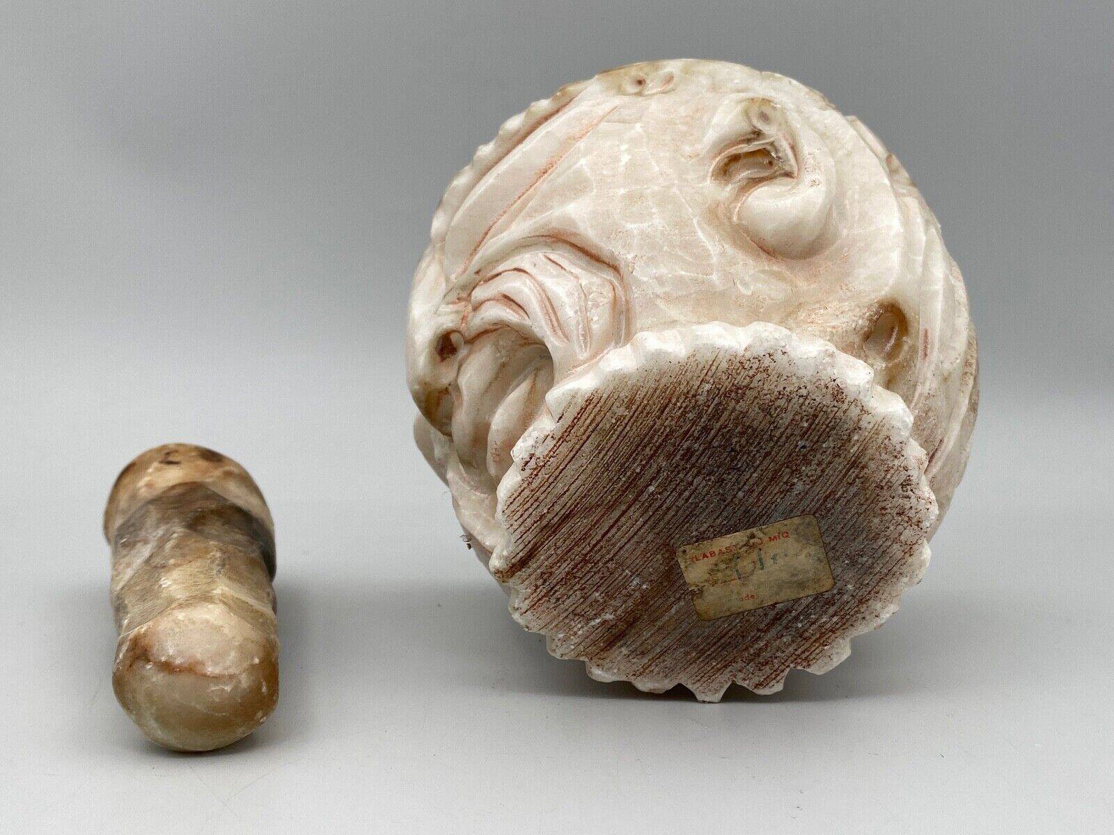 Pharmacy mortar and pestle in alabaster China man's face