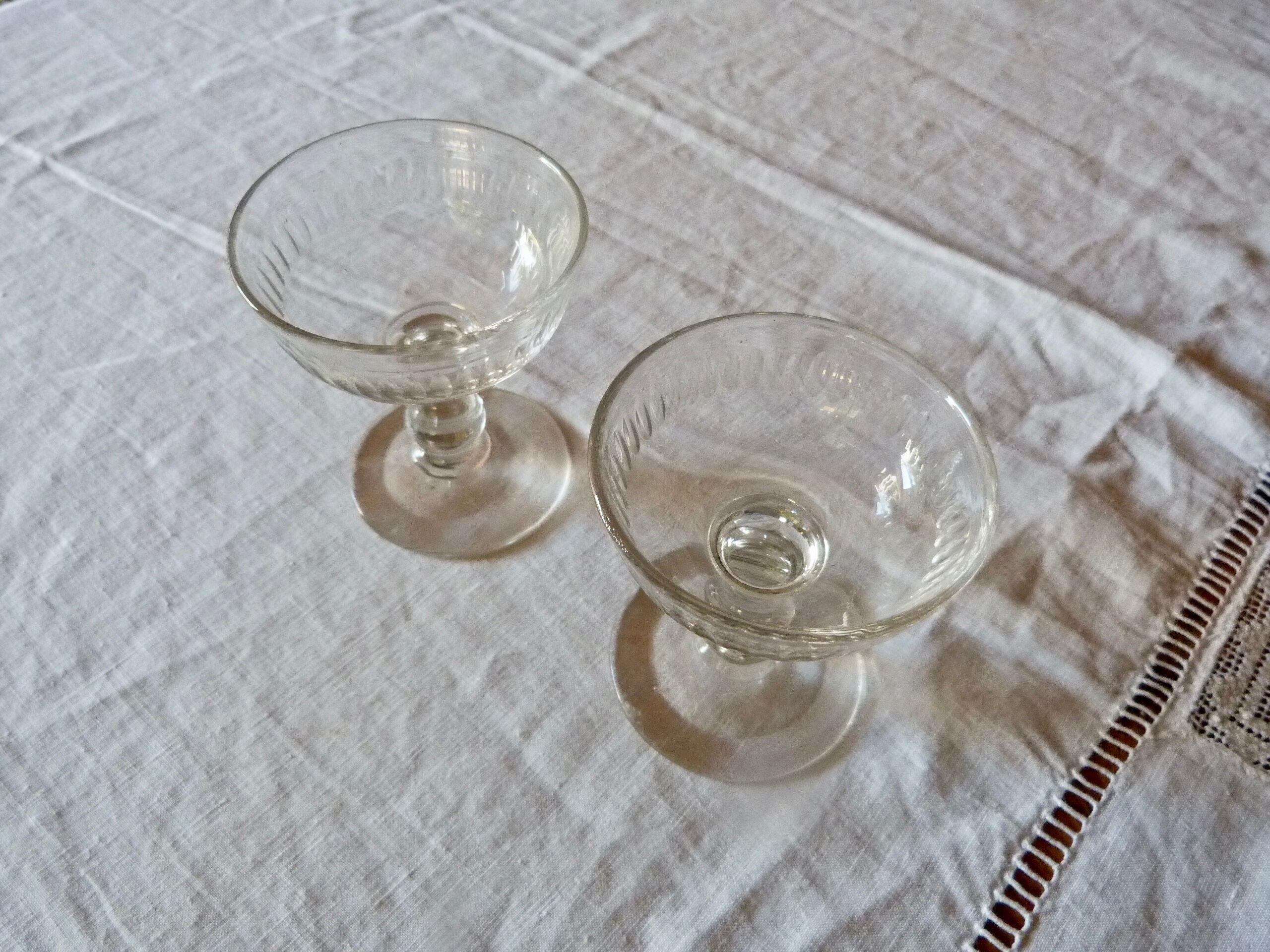 Set of 2 old foot glasses for liqueur