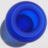 Blue polished glass vase.