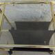 Vintage gilded metal magazine door with glass top and two compartments