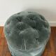 Velvet upholstered pouf