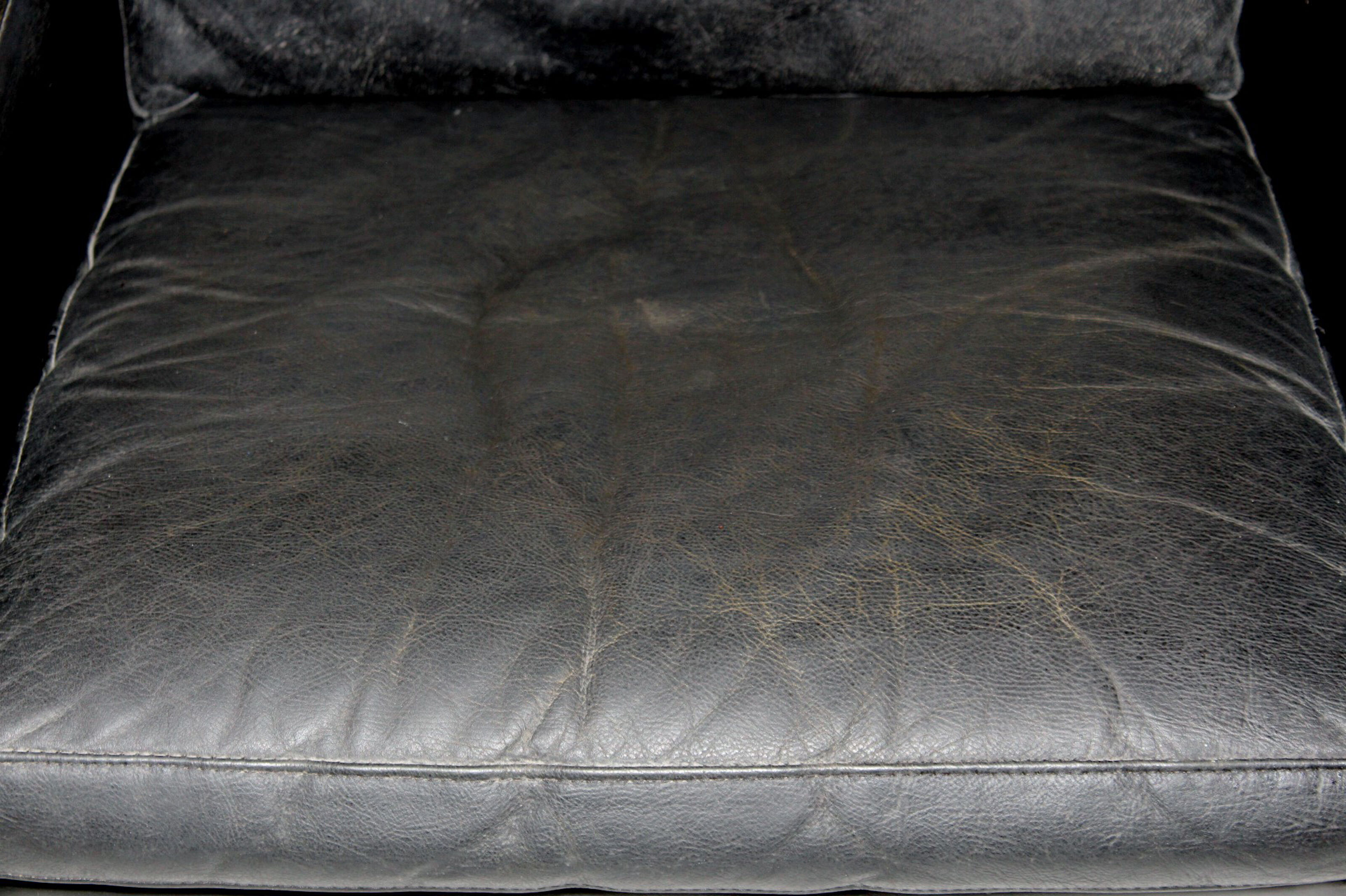 Fauteuil en cuir et palissandre Danemark 1960