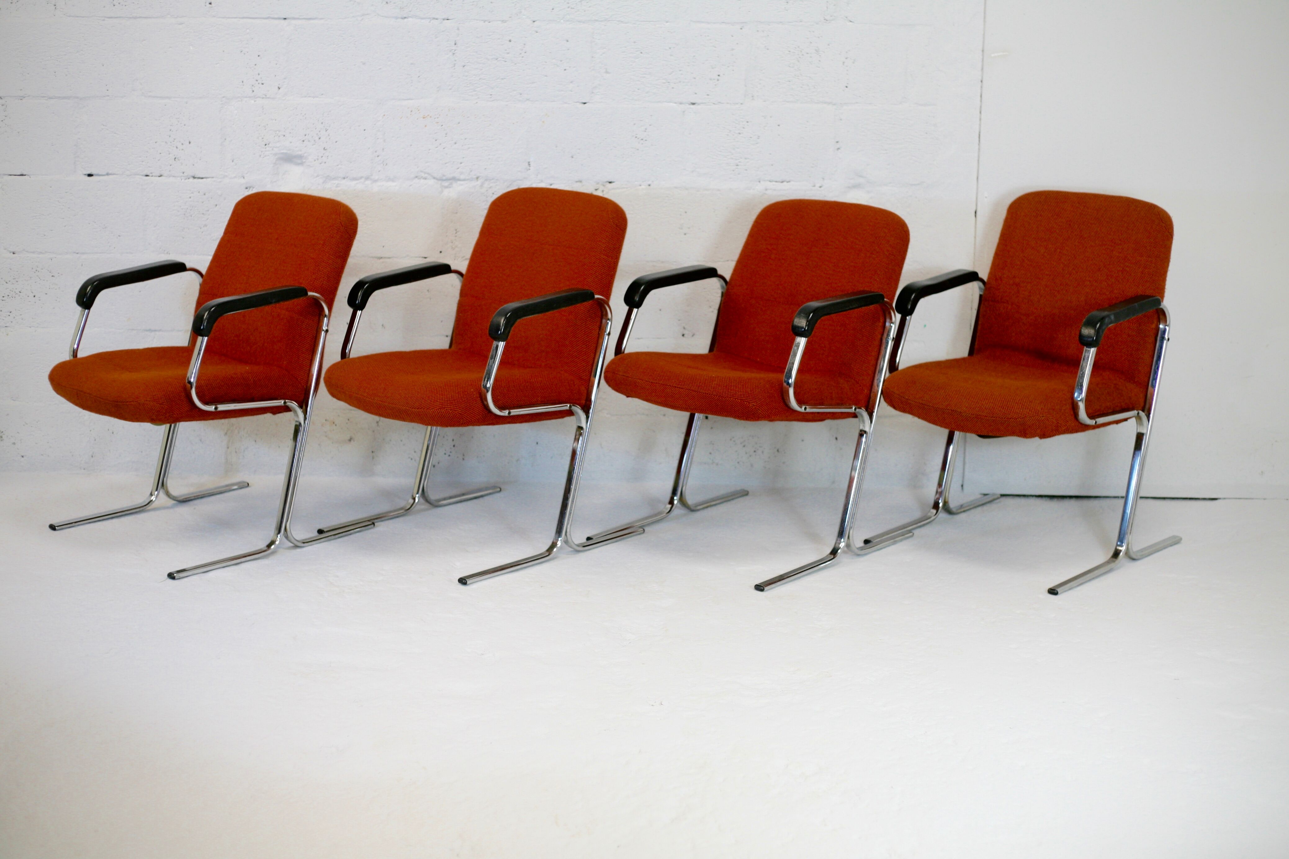4 "space age" armchairs, chrome steel base