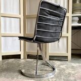 2 chairs in chromed metal and black woven skaï 1970s