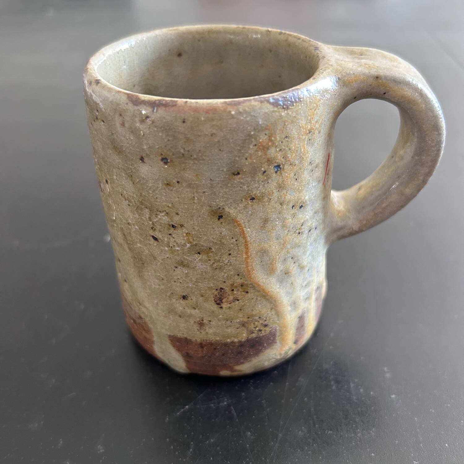 Pair of signed stoneware mugs