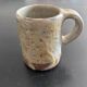 Paire de mugs en grès signées