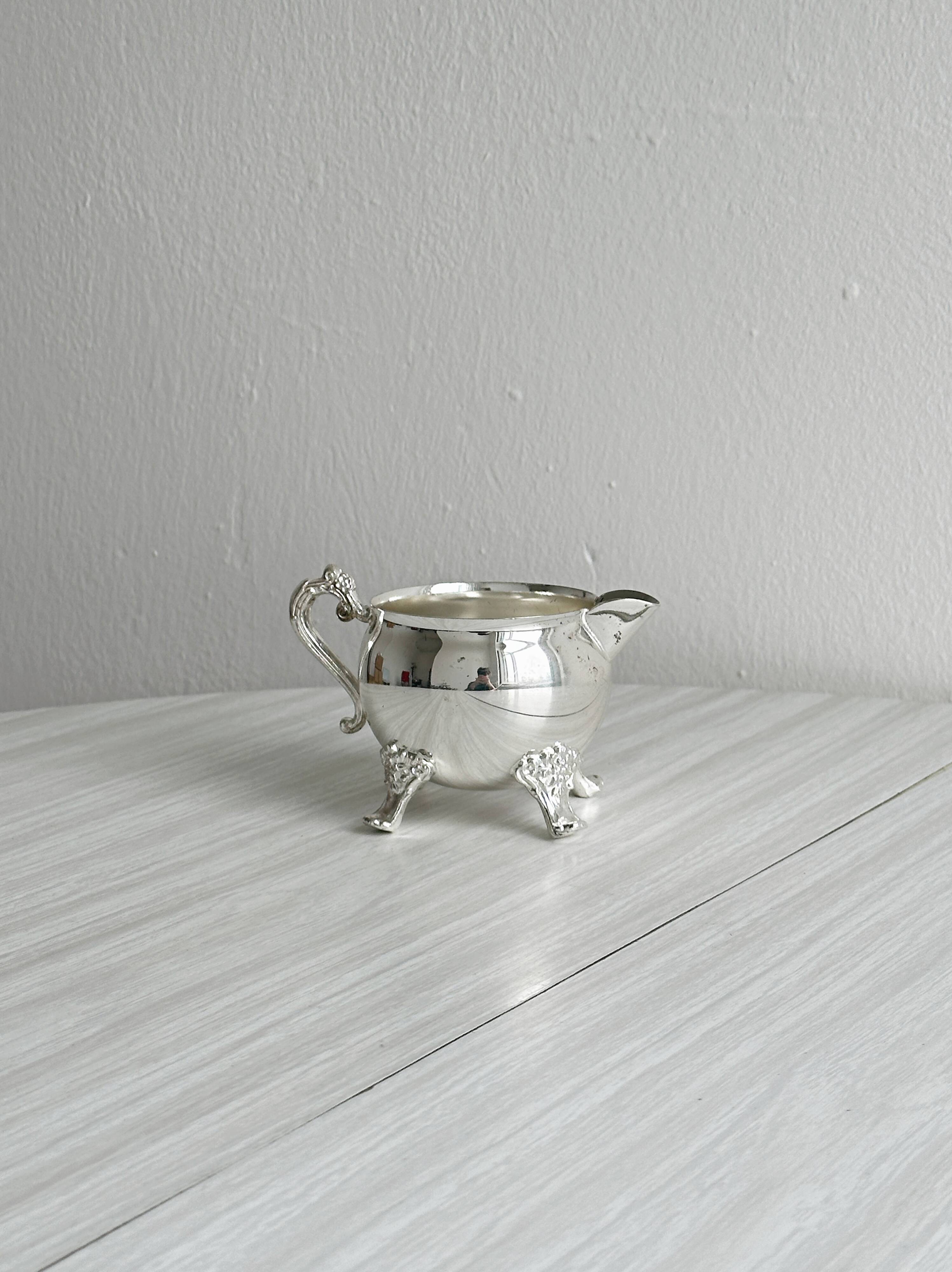 Antique metal sugar bowl