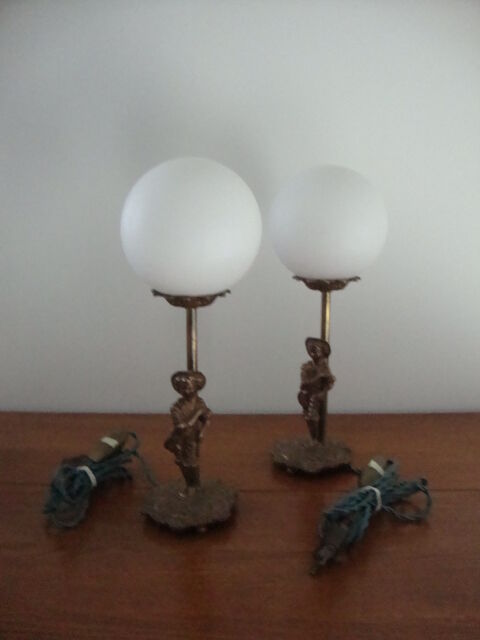 Pair of art deco lamps in gilded bronze