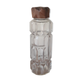 Glass bottle with wood cap