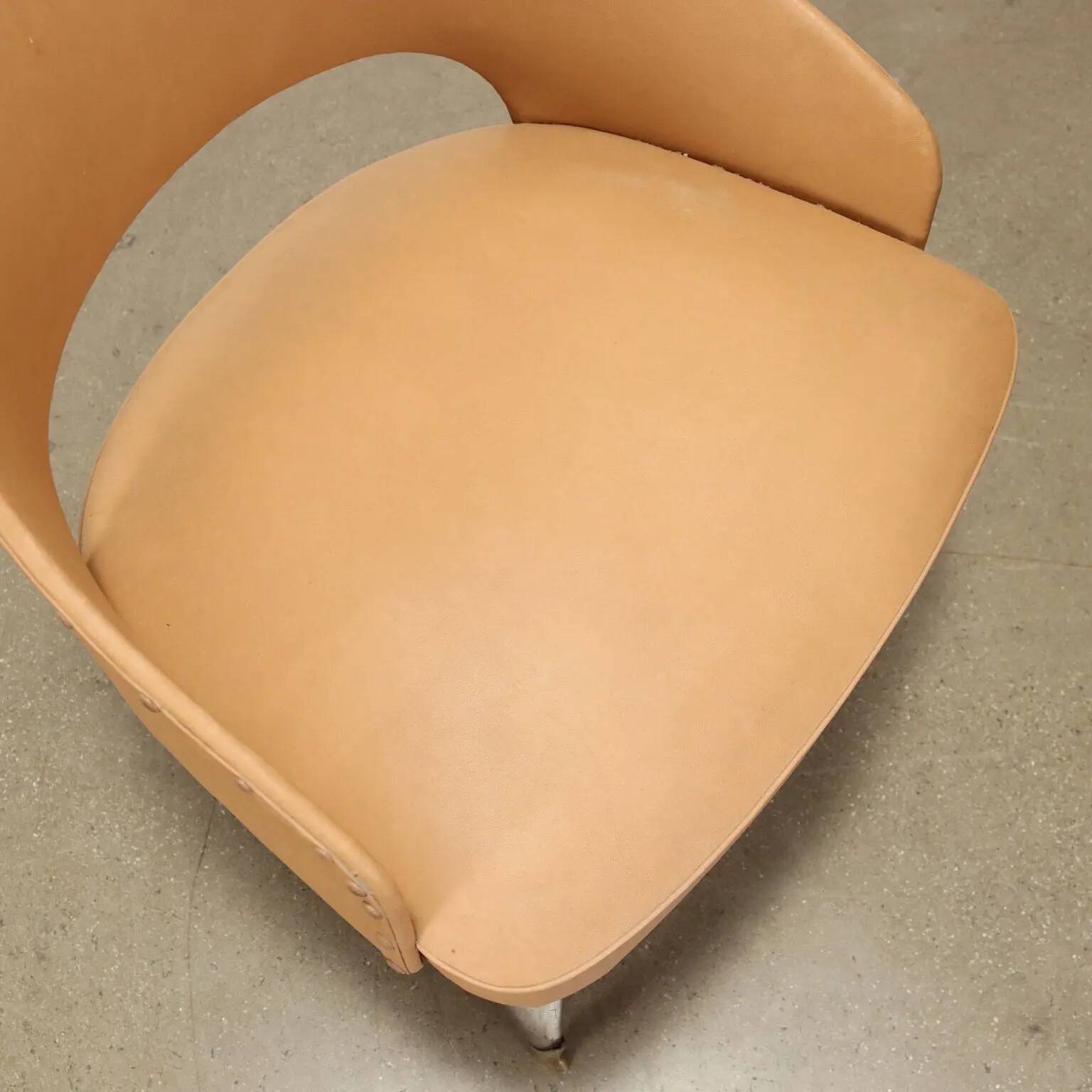 Pair of vintage armchairs from the 50s-60s in ebony wood, brass, with padded seats.