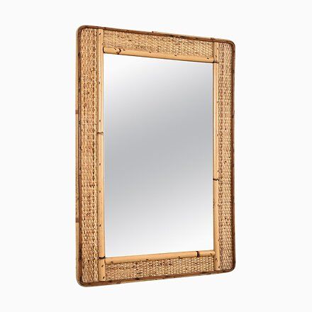 Wooden mirror decorated with gold from the 1920s