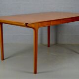 Extendable table by A.H. McIntosh