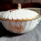 Soupière en procelaine de Limoges blanche et dorée