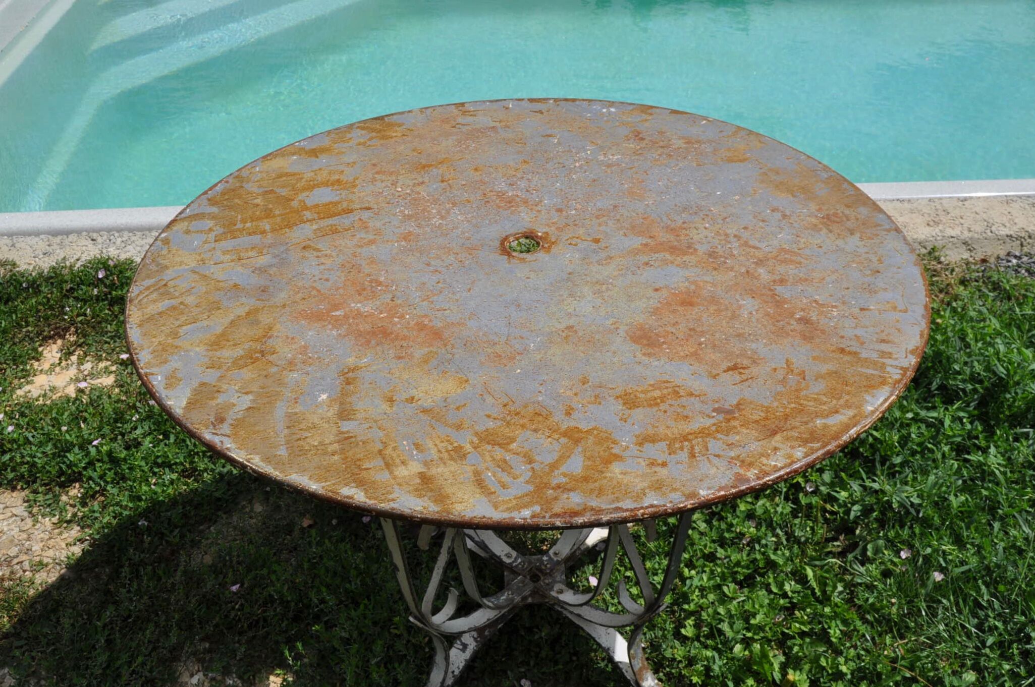 Sheet metal and iron garden table
