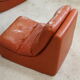 Flexible sofa, orange vinyl and foam, France, circa 1970