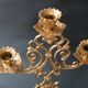 Antique three-light openwork brass church candelabrum.