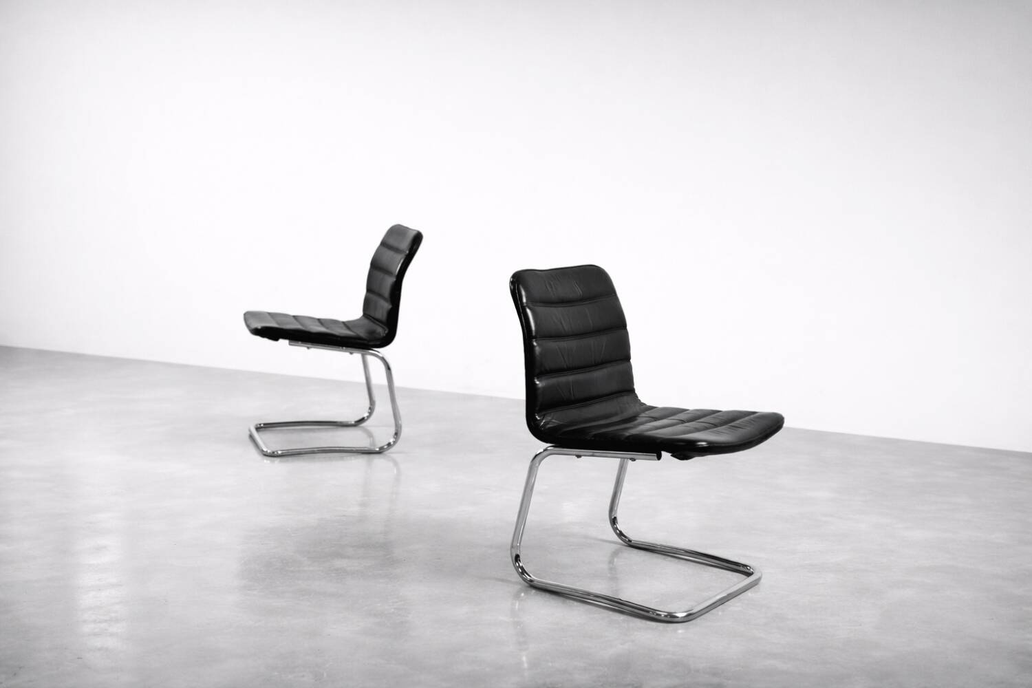 Vintage Mid-Century Minimalist Chrome and Black Leather Club Chairs