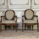 Pair Of Louis XVI Armchairs In Carved Wood, 18th Century