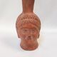 Jug vase with human head