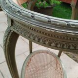 Old oval table with marble top, Louis XVI style